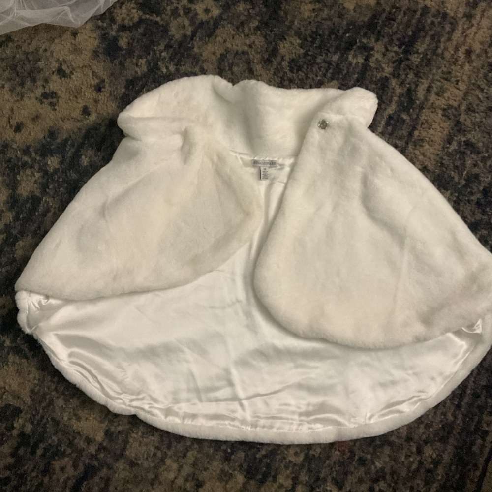 A short white fluffy cloak